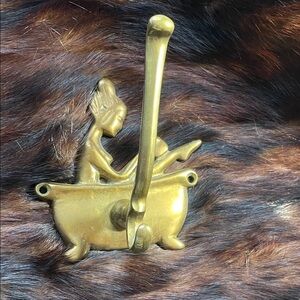 Brass wall hook woman bathing